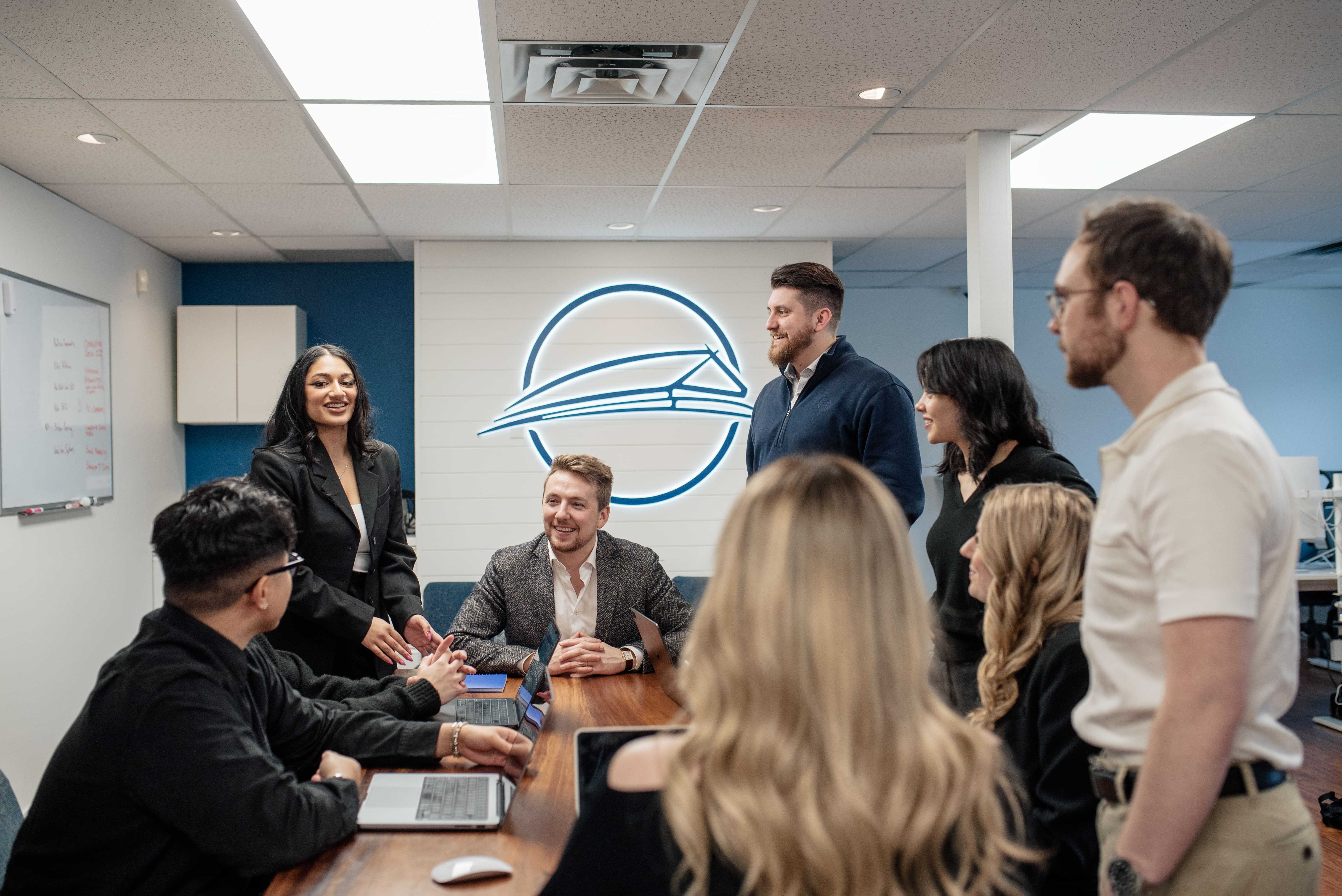 Keenan talking with Longhouse Team
